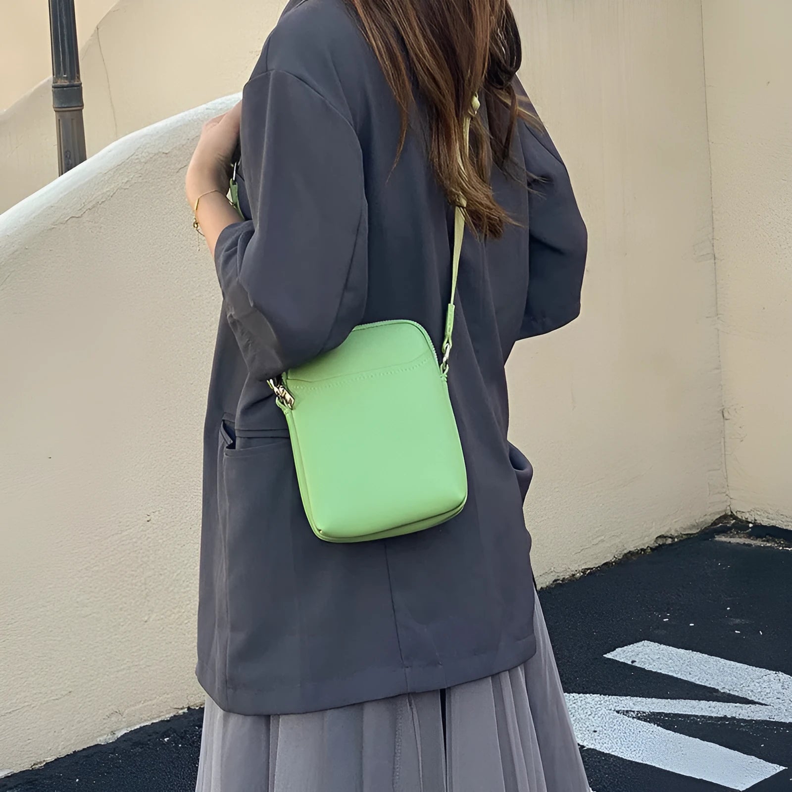 Solid colour small crossbody shoulder bag in PU leather measuring 14.5cm by 5.5cm by 19cm