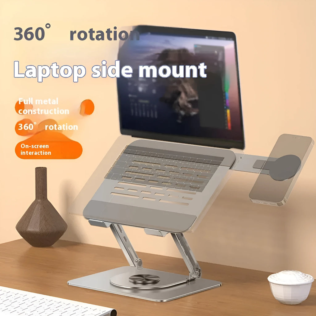 Silver carbon steel laptop stand with a side-mounted magnetic phone holder rotated to show its 360-degree movement.