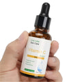 30ml bottle of vitamin C serum essence for facial brightening and antioxidant treatment
