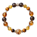 Natural yellow tiger-eye crystal bracelet in geometric tower design showing 10mm and 12mm size options