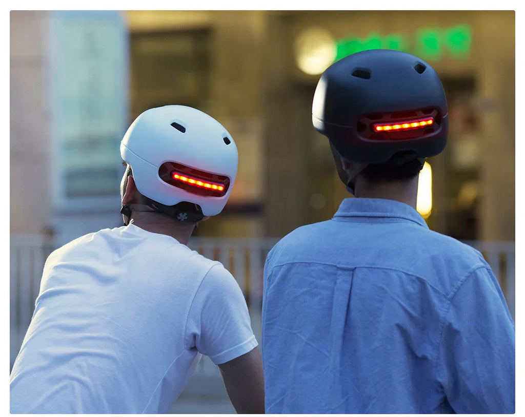 Smart helmet with automatic photosensitive warning lights in black, EPS and PC construction, side view