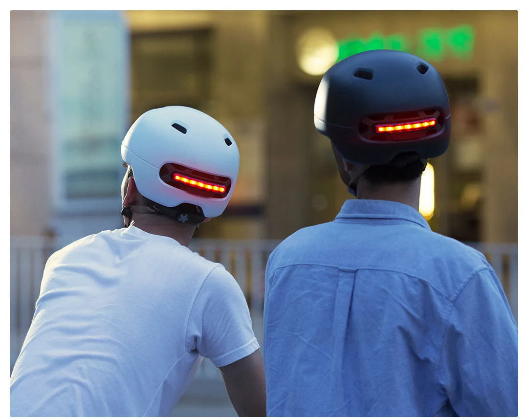 Smart helmet with automatic photosensitive warning lights in black, EPS and PC construction, side view