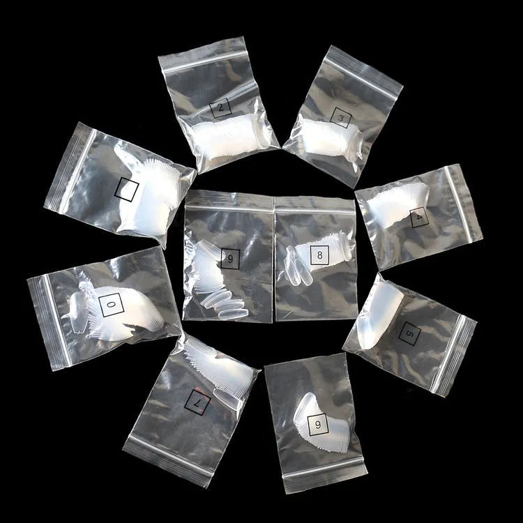 500 clear ABS artificial nails in 10 sizes with French tip design for professional and home use
