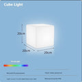 Modern white LED square cube light for outdoor garden and pathway illumination.