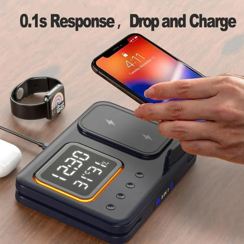 Black and white 15W wireless charging station with LED display showing time, charging phone, watch and headphones