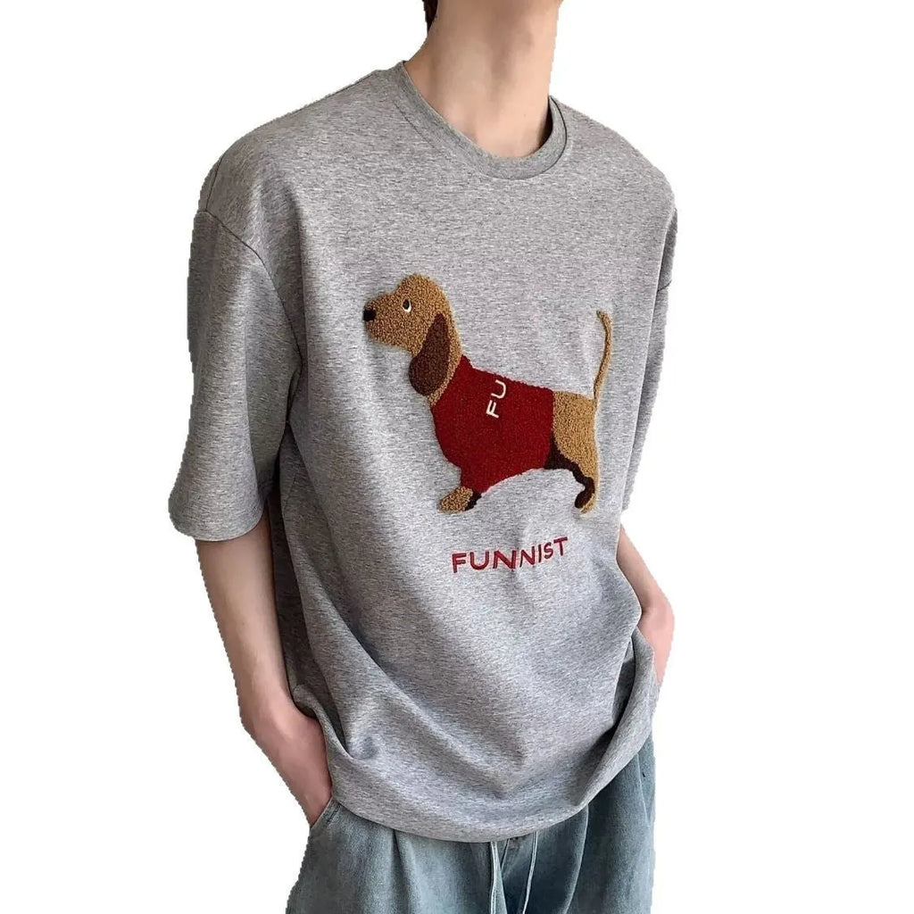 Grey men's T-shirt with a raised towel embroidery sausage dog design on the chest.