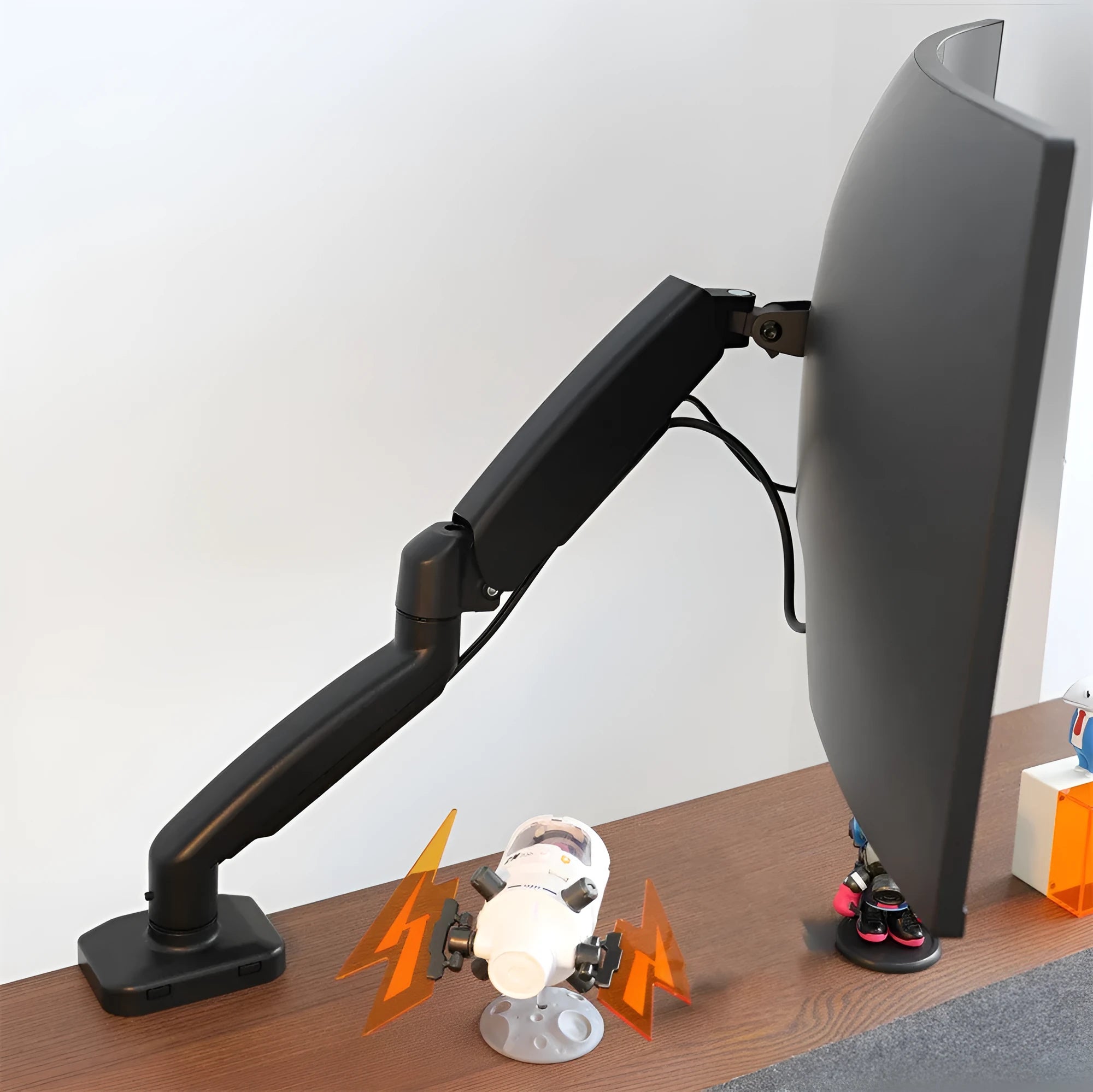 Black and white rotating telescopic LCD screen bracket on a table