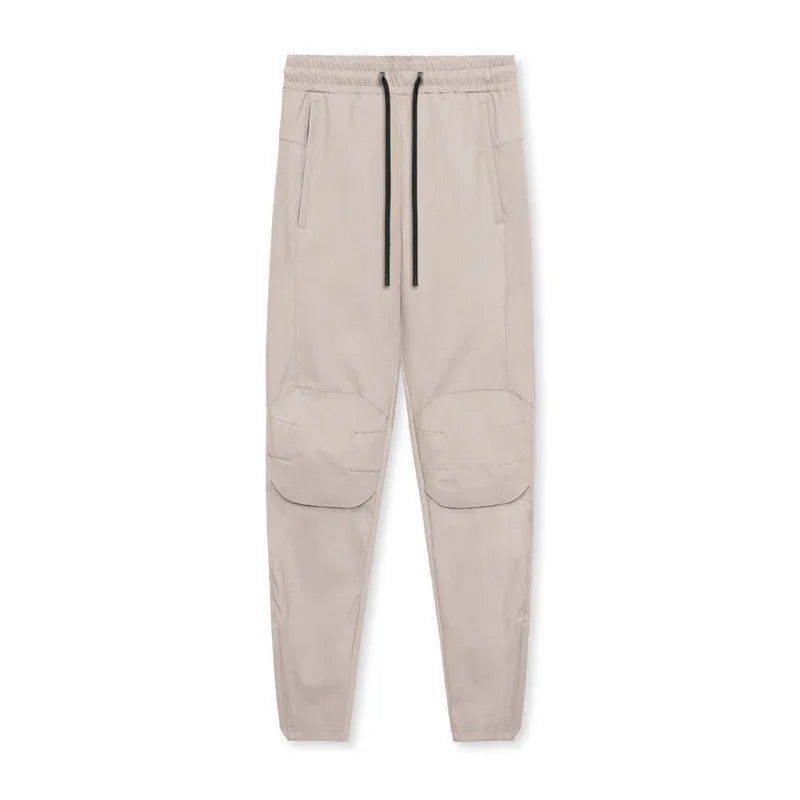 Men's grey ankle-tied fitness trousers with loose casual cut for exercise