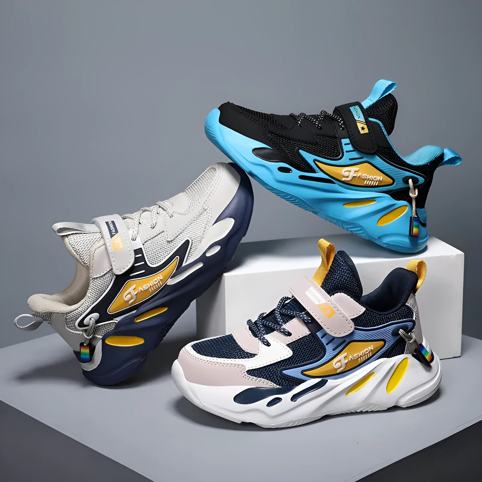 Boy's dark blue and black Velcro-fastened platform sports running shoes with breathable mesh upper.