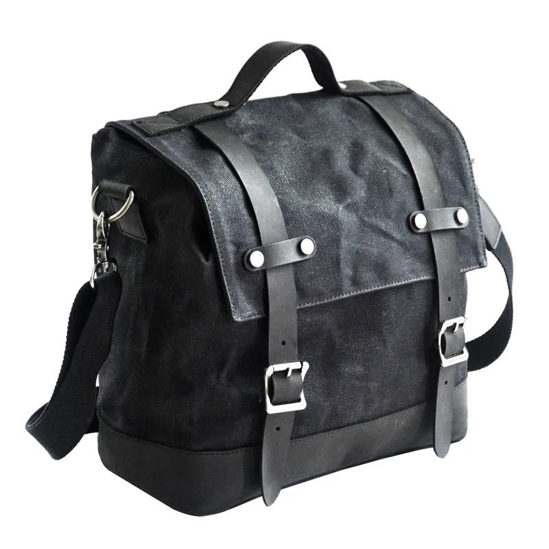 Waterproof canvas motorcycle side bag with cowhide reinforcement in black colour