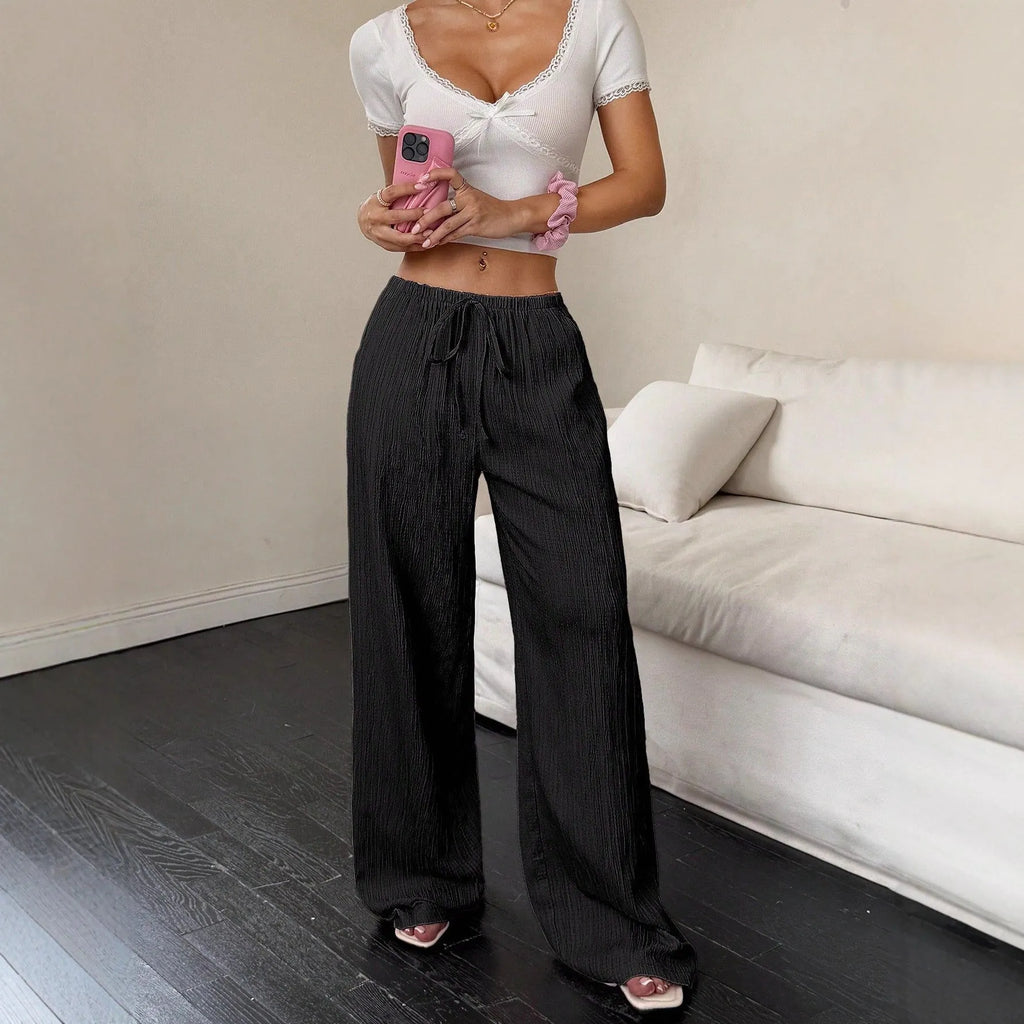 Women's black wide-leg trousers with lace-up waist detail
