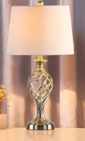 Silver alloy bedside table lamp with touch controls and USB charging port on base