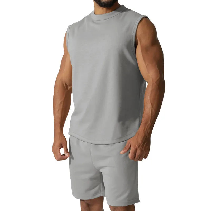 Men's sleeveless sports suit set in cotton blend with matching shorts in solid colour options