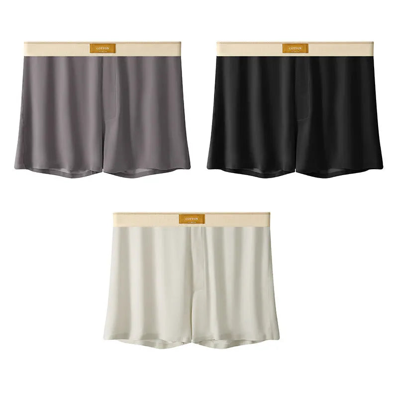 Men's loose fit ice silk underwear in solid colours showing mid-waist design and breathable fabric texture.