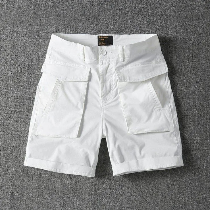 Men's army green cotton cargo shorts with multiple pockets on a straight leg.