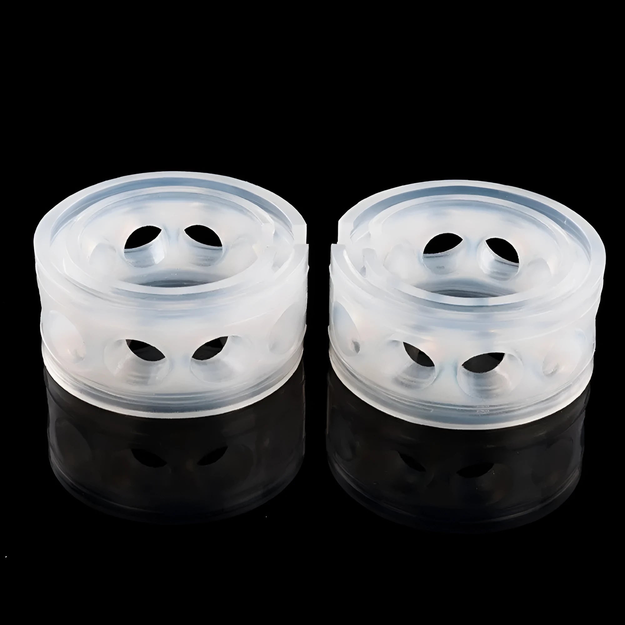 Two transparent rubber shock absorber buffers for car suspension springs, shown with size measurement diagram.