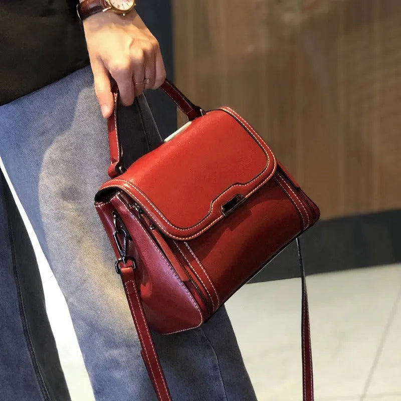 Genuine leather women's messenger bag in horizontal square shape with multiple pockets and double shoulder straps