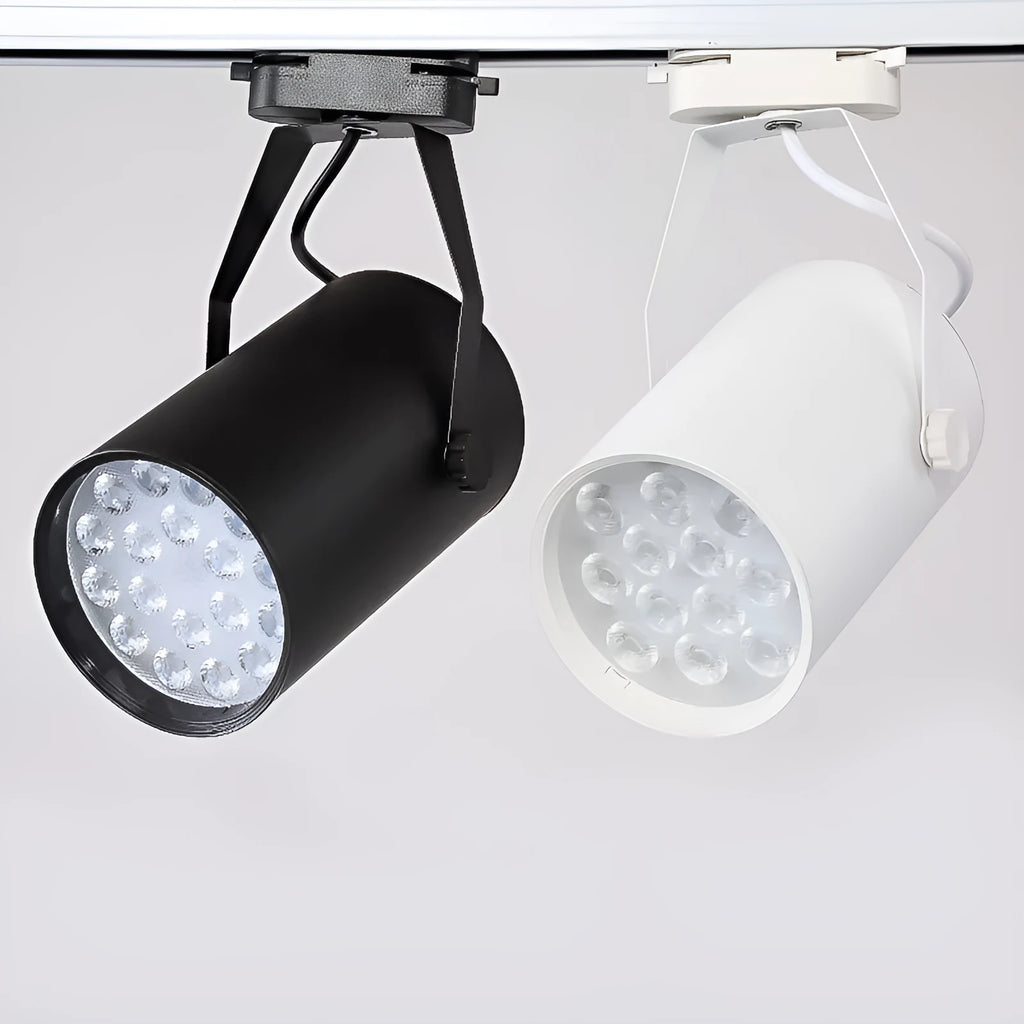 Black and white aluminium shell LED track spotlight mounted on a lighting track for display use.