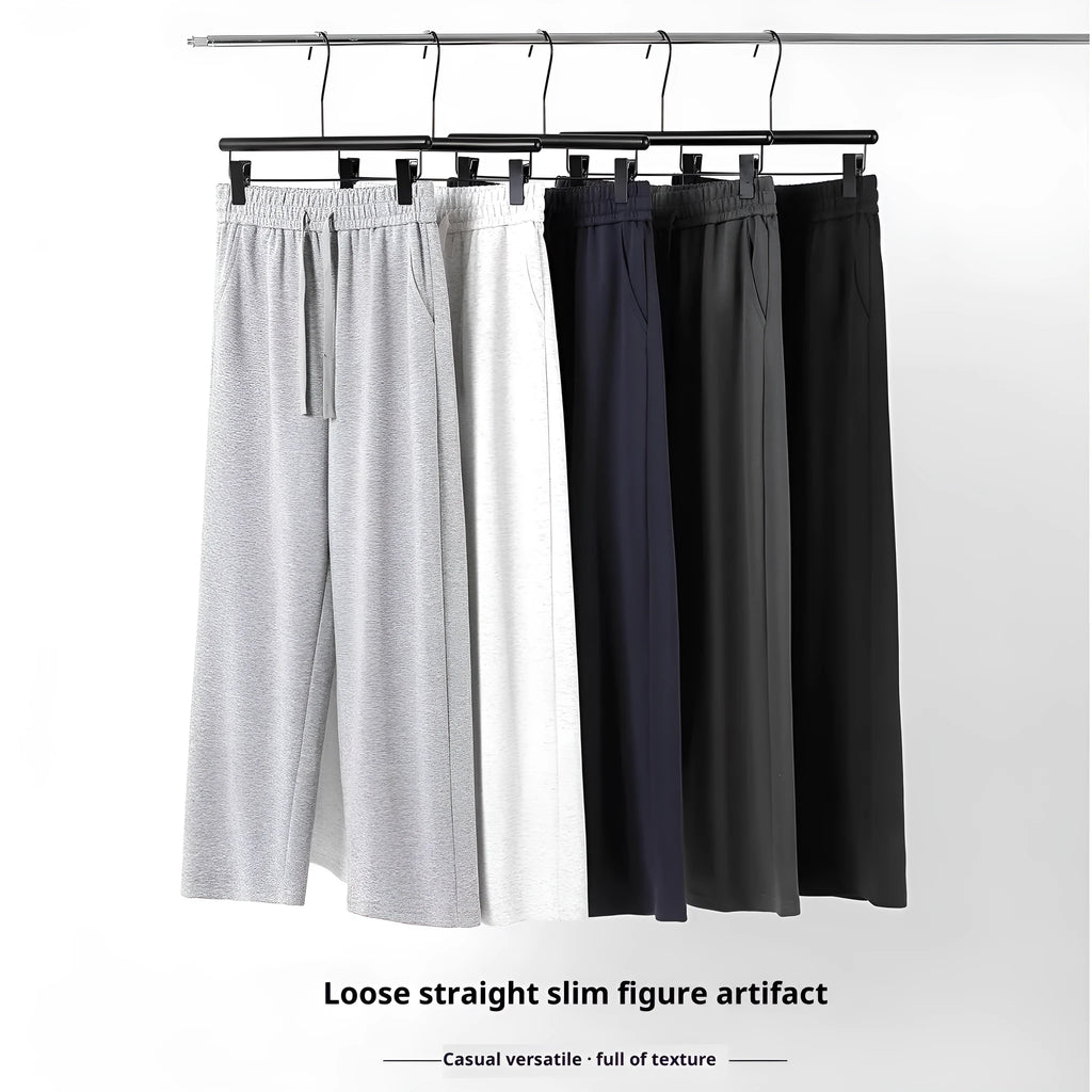 High-waisted casual straight-leg cotton sweatpants in loose fit, available in multiple colours