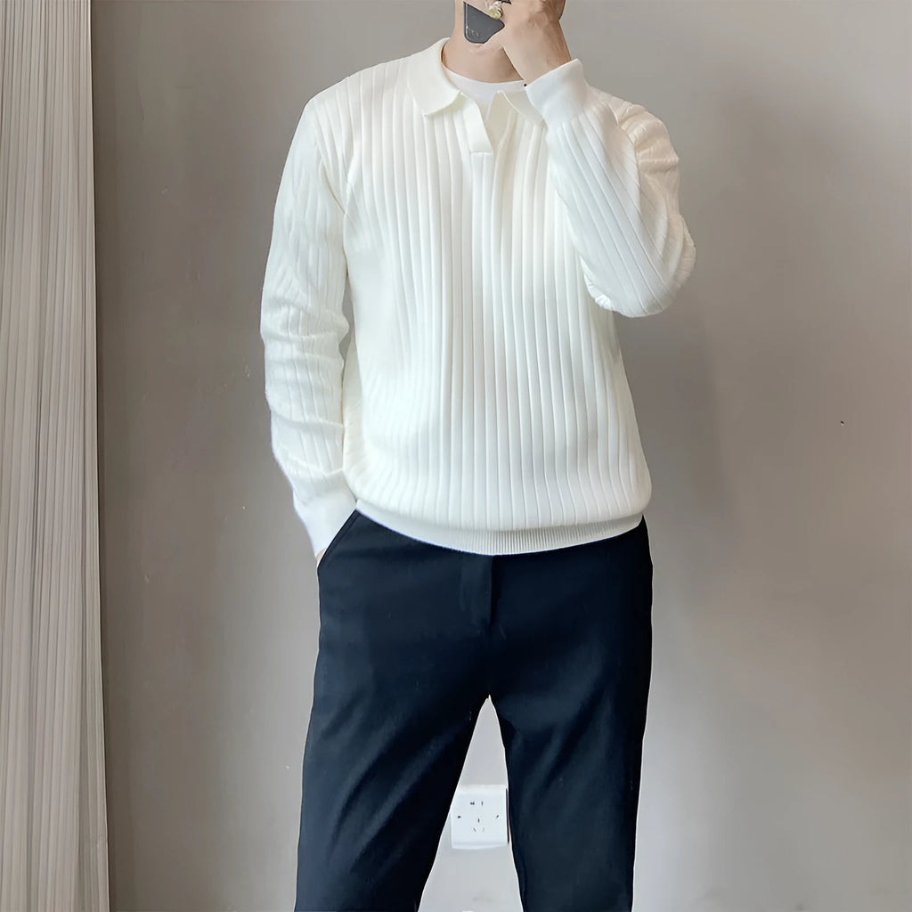 Man wearing a loose-fit Army Green knitted pullover sweater with long sleeves.