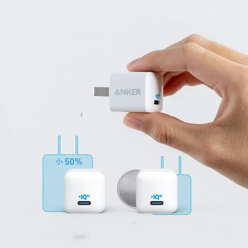 White 18W USB travel charger for mobile phones with fast charge capability