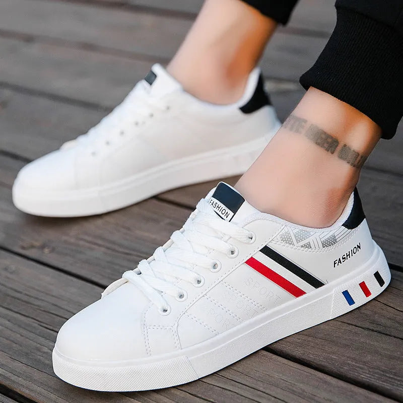 Black, grey, and white sports shoes on a size chart showing EU sizes 39 to 44 with foot length measurements.