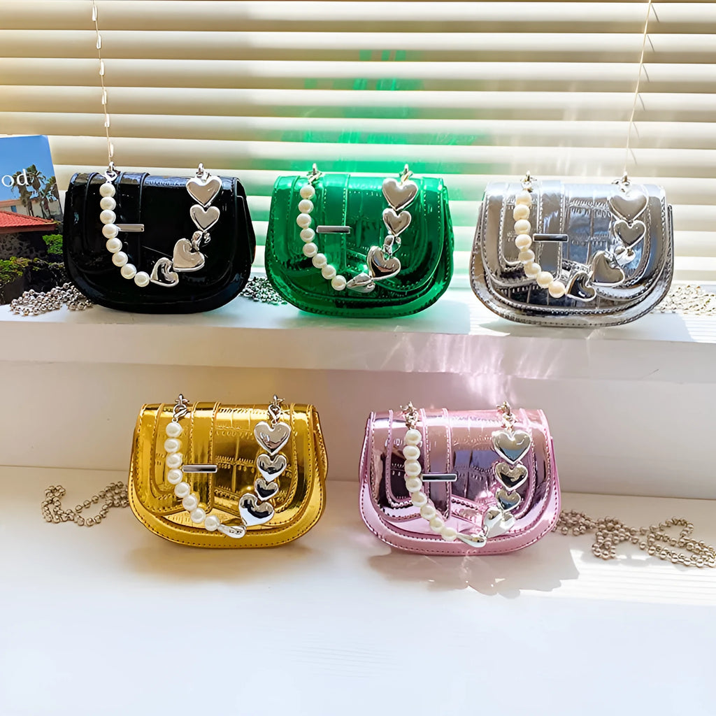 Silver PU leather mini tote saddle crossbody bag for women with a single strap.