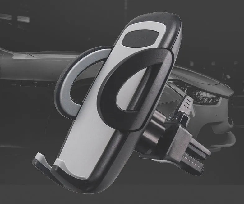 Black plastic car mobile phone holder mounted on vehicle air conditioning outlet