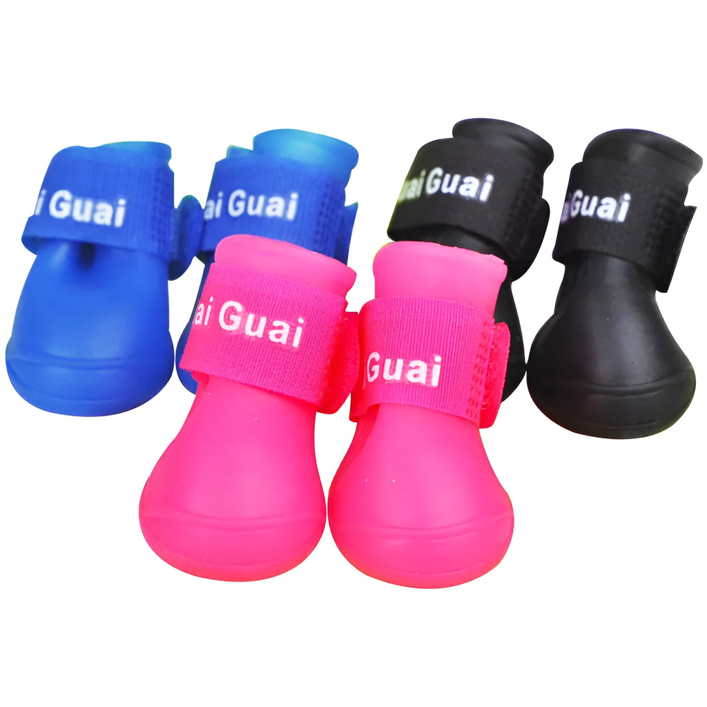 Soft silicone pet rain boots in royal blue and yellow, showing non-slip sole, for dogs size S M L