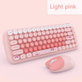 Candy Pink wireless keyboard and mouse set on a desk with USB receiver