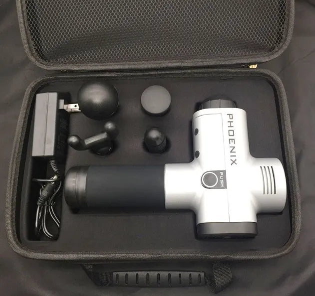 Black and silver deep tissue massage gun with four interchangeable heads on a grey background