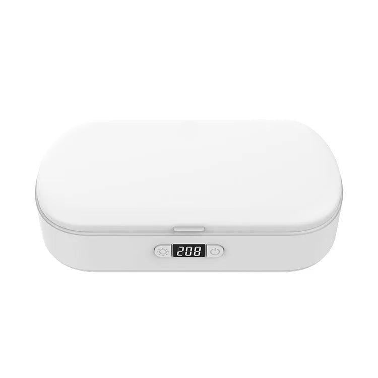 White ABS UV steriliser and wireless charging box for mobile phones and toothbrushes.
