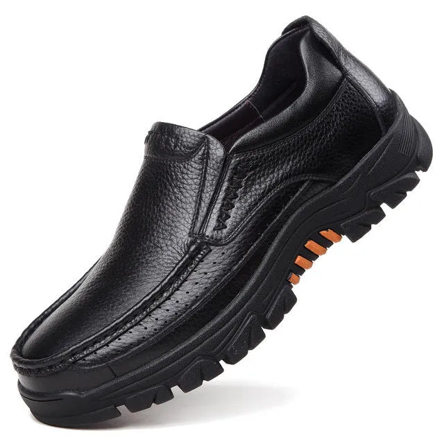 Men's black and brown leather slip-on business casual shoes with a rubber sole.