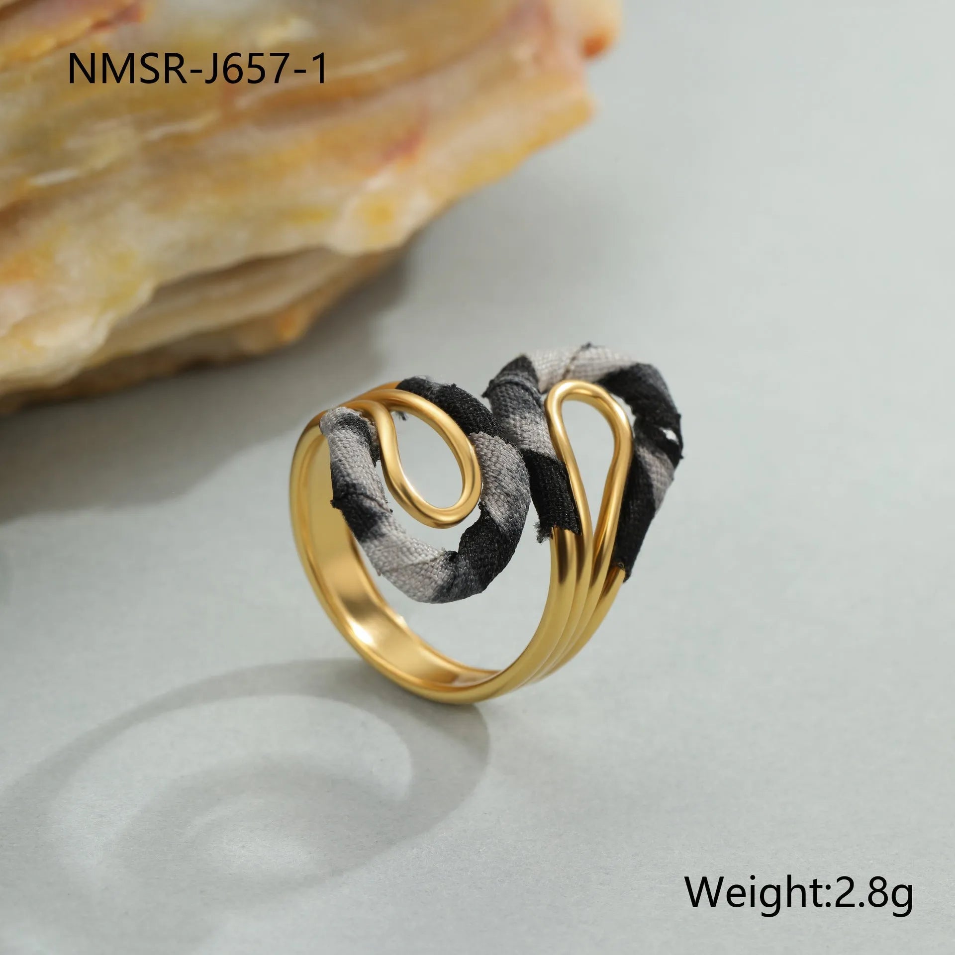 Geometric stainless steel open mouth ring with leopard print patterns in heart and star shapes