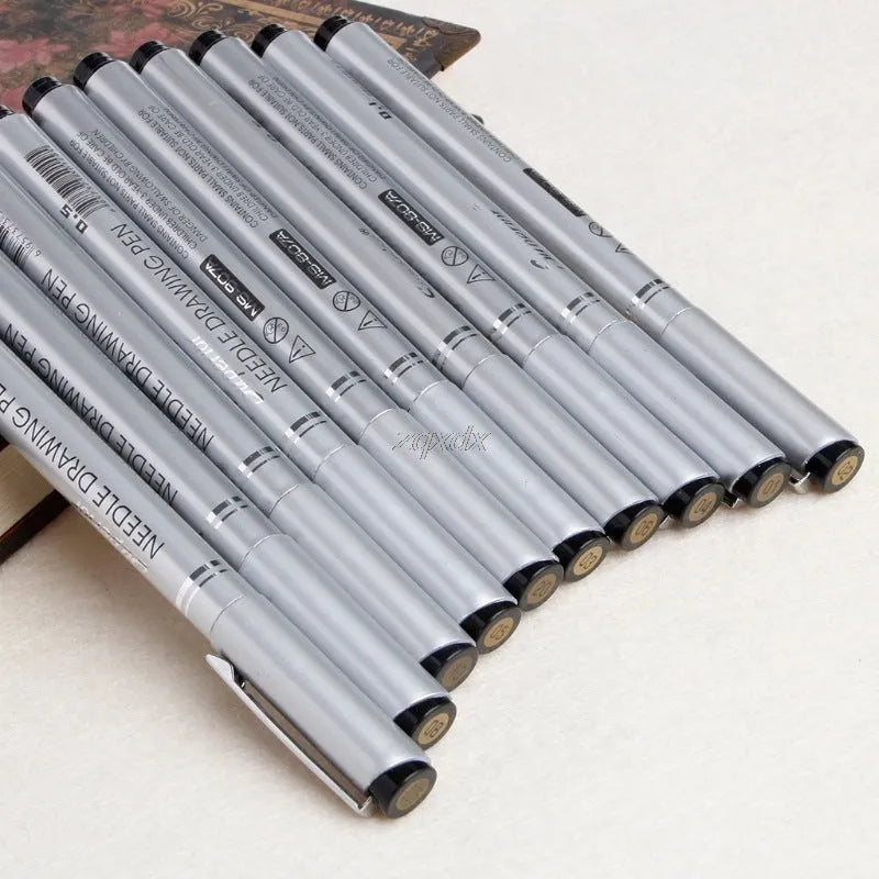 Set of 10 black fine liner drawing pens with tip sizes from 0.05mm to 2.0mm on white background