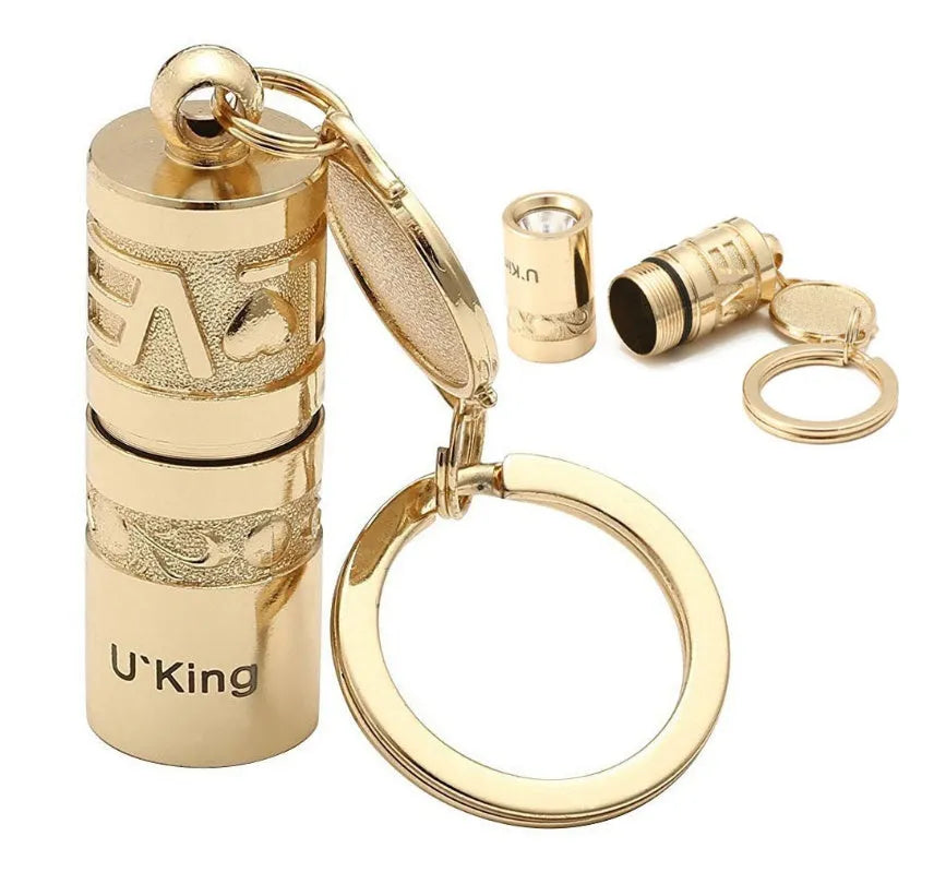 Gold zinc alloy waterproof keychain flashlight with LED light and key ring attachment
