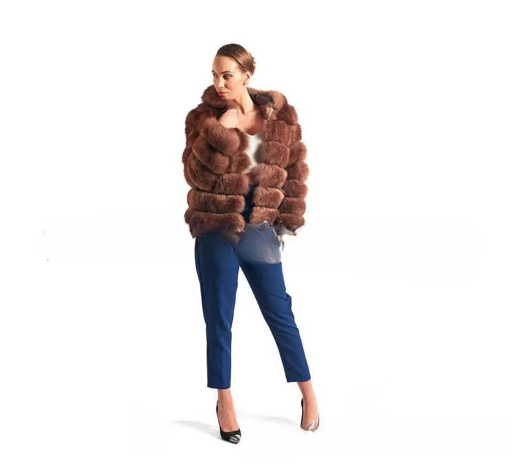 Women's loose artificial fur coat with hood in brown colour on mannequin