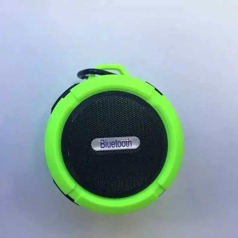 Waterproof portable Bluetooth speaker in multiple colours with mountaineering buckle attachment