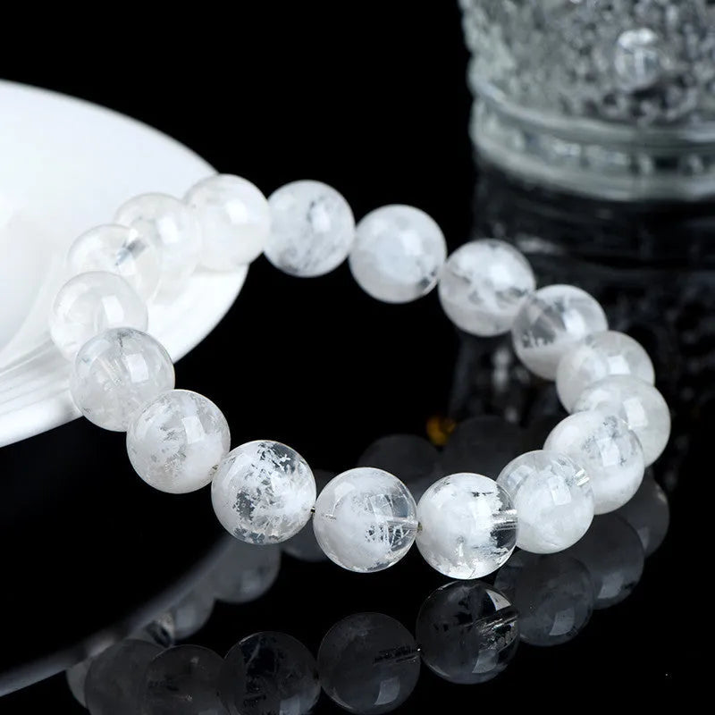 Women's natural blizzard snowflake round crystal bead bracelet with Ruyi and Xiangyun design.