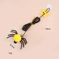 Red and yellow door-hanging cat toy with elastic rope, feather, bell and spider attachment for indoor feline play