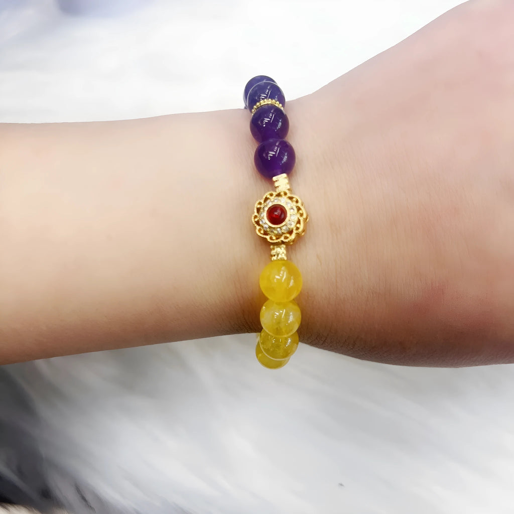 Handmade women's yellow and purple amethyst crystal bracelet with secure clasp fastening