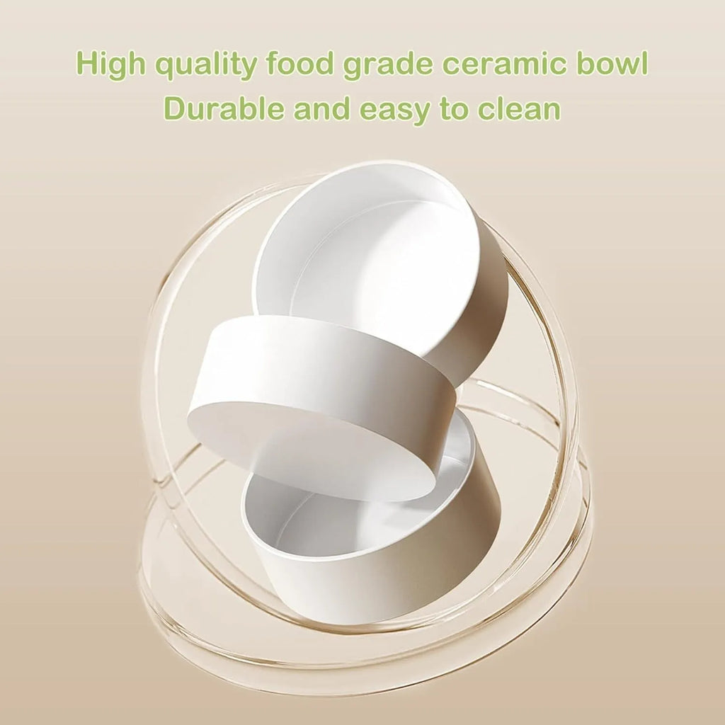 Green ceramic raised pet feeder with two tilted bowls on a non-slip stand