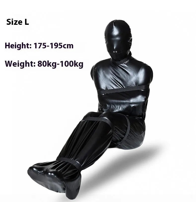 Black patent leather bondage suit with six ratchet tie down pieces for full body restraint