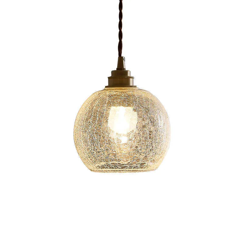 Brass chandelier with glass ball shades measuring 17.5cm wide, showing electroplated copper construction