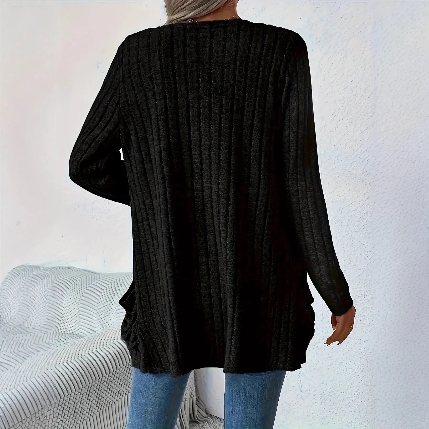 Long sleeve loose fit cardigan in solid colour with pockets, shown in black and granny grey.