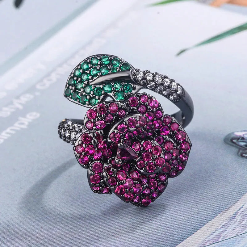 Black gold colour women's ring with geometric flower design and simulation red corundum stone