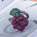 Black gold colour women's ring with geometric flower design and simulation red corundum stone