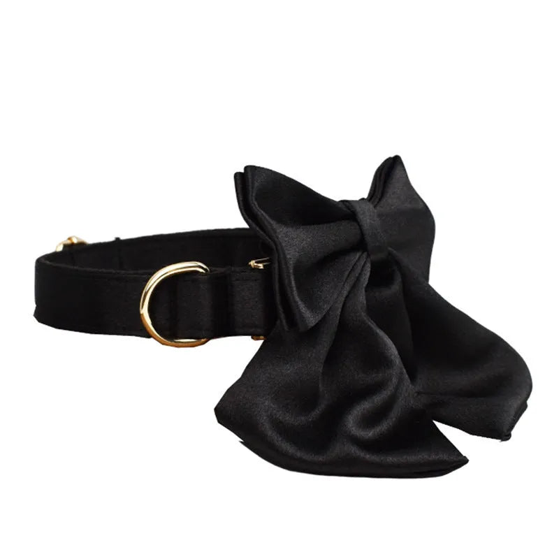 Cloth dog collar, leash, bow, and vest set shown on a model, available in S M L XL sizes.