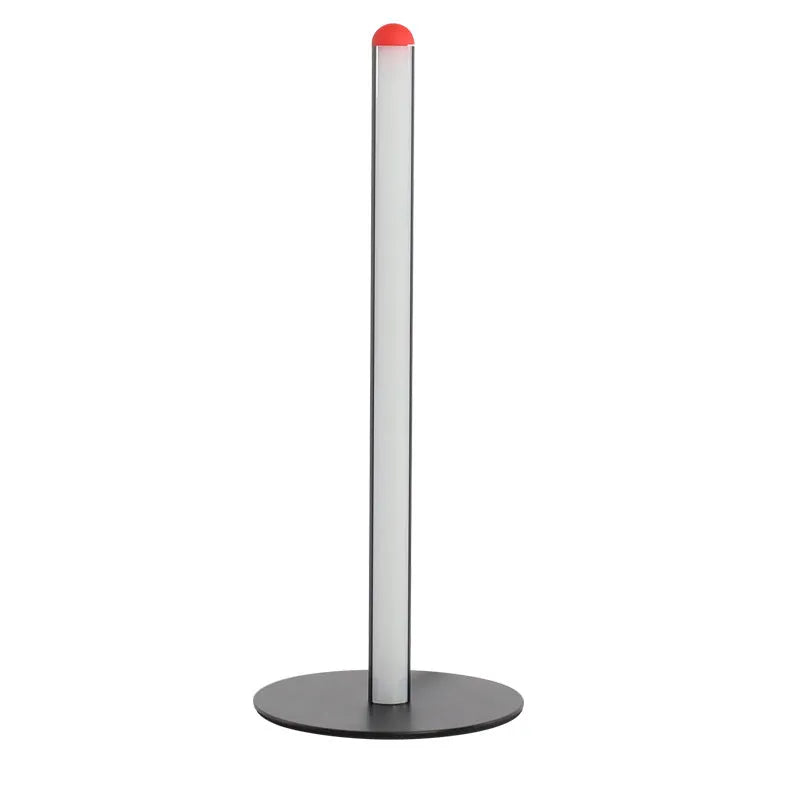 Modern simple vertical aluminium alloy floor lamp in silver, shown beside a sofa.