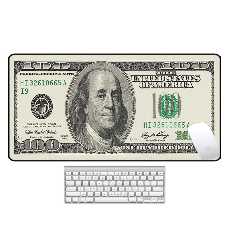 Large thermal transfer printed mouse pad with natural rubber non-slip base on a desk.